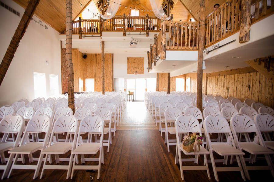 Badger Farms wedding barn ceremony chair setup